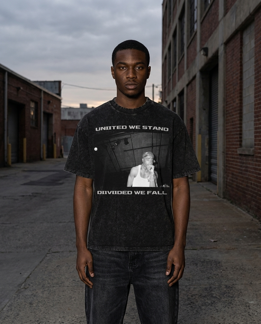 Model wearing Gilded Streets x 2Pac United We Stand Acid Wash Tee, limited capsule