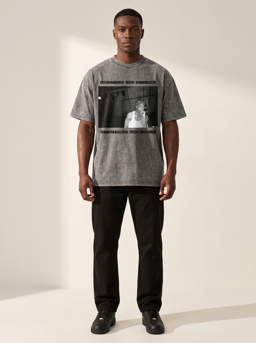 Model wearing the Gilded Streets x 2Pac United We Stand Acid Wash Tee