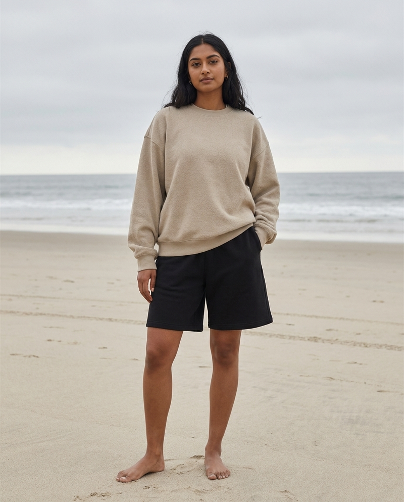 Model wearing Gilded Streets Heavyweight Fleece Shorts, coastal editorial look