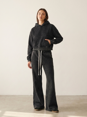 Model wearing the Mineral Wash Flared Leg Sweatpant with the Mineral Wash Crop Hoodie