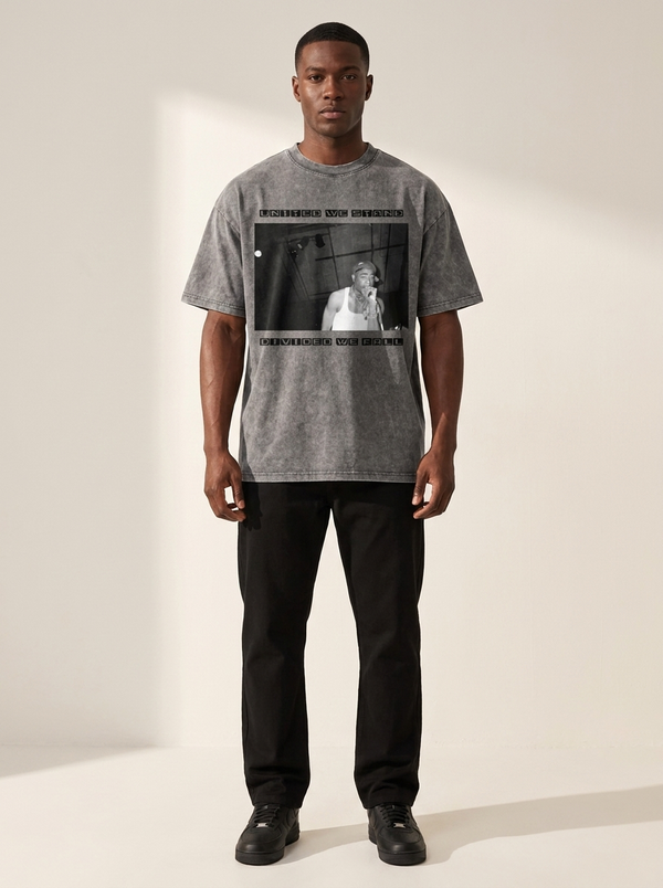 Model wearing the Gilded Streets x 2Pac United We Stand Acid Wash Tee